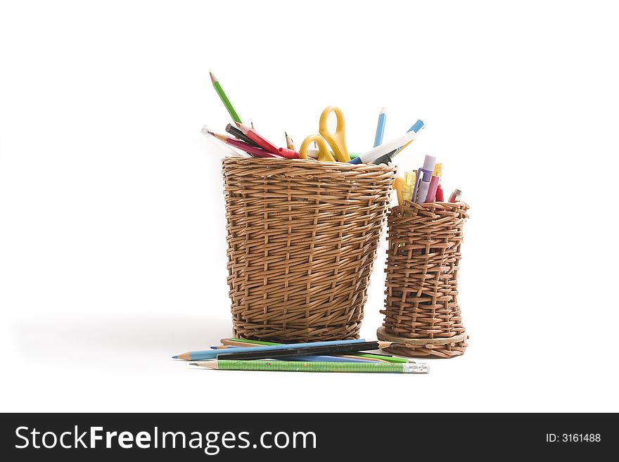 Basket with pensils on white background. Basket with pensils on white background