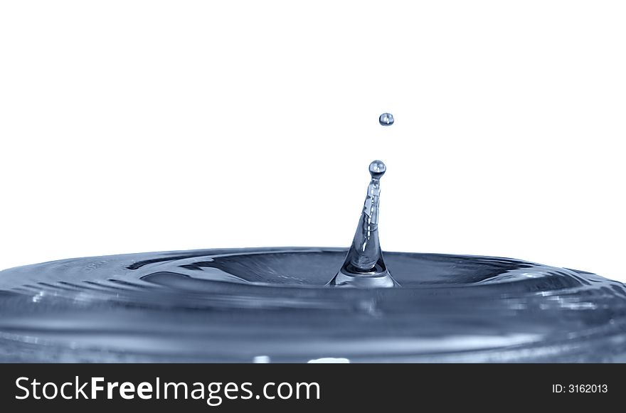 Isolated blue drops are falling down and impact with liquid surface. Isolated blue drops are falling down and impact with liquid surface