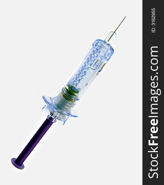 Hypodermic syringe with a drop on the needle