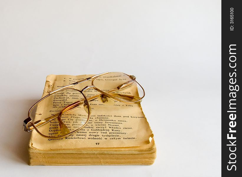 Old Prayer Book And Glasses