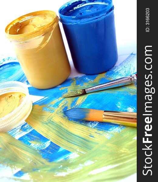 Blue and yellow paint jar with gouache