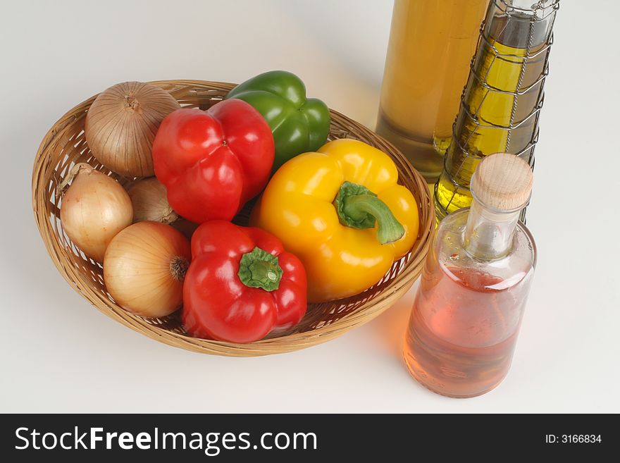 Basket With Peppers And Oil