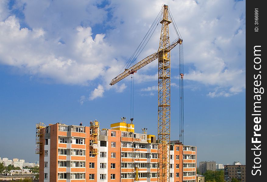 Crane with buildings in the background. Crane with buildings in the background