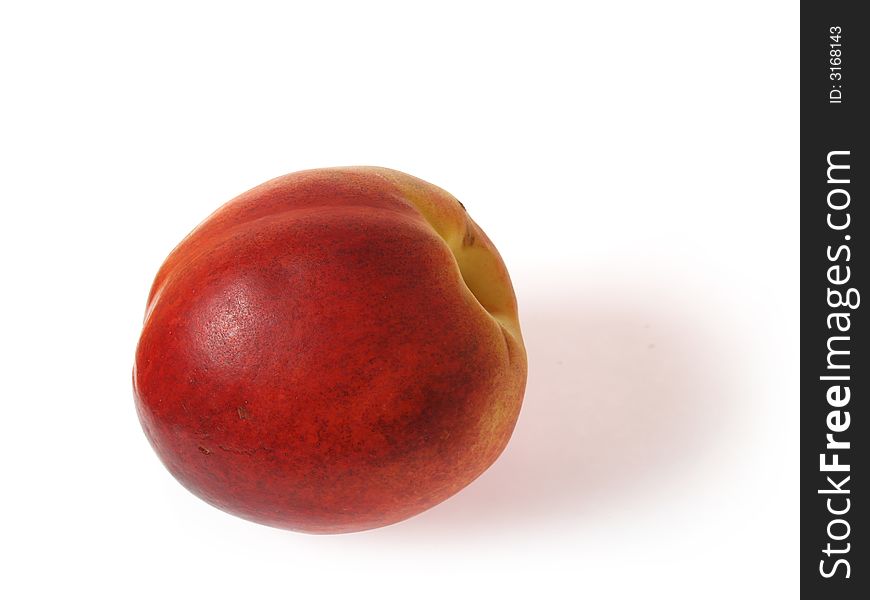 Tasty juicy nectarine on a white background with clipping mask. Shadows is not included in clipping mask