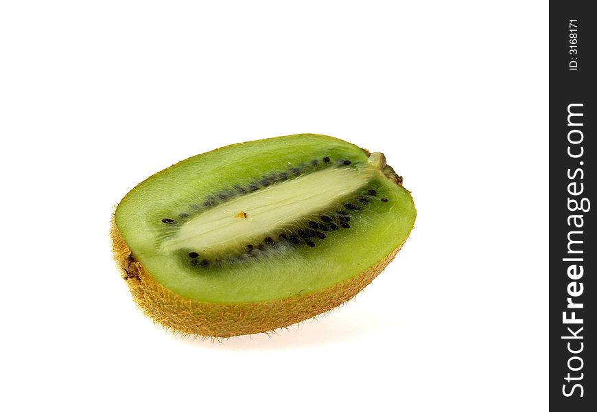 A sliced kiwi fruit, isolated on white. A sliced kiwi fruit, isolated on white
