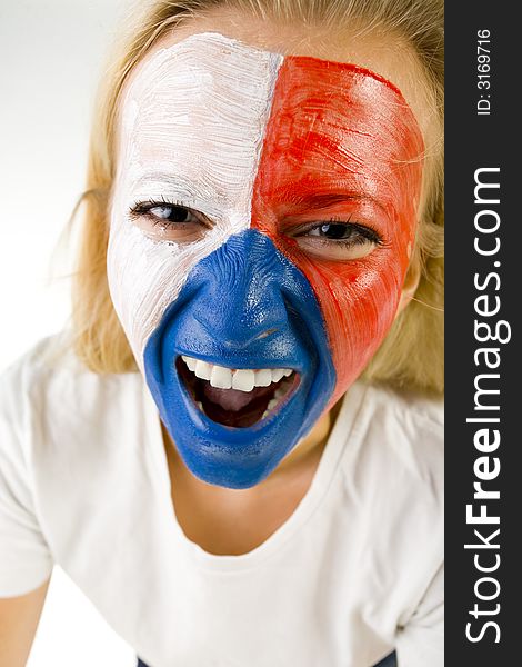 Young screaming Czechish sport's fan with painted flag on face. Front view. She's looking at camera. Closeup on face. Young screaming Czechish sport's fan with painted flag on face. Front view. She's looking at camera. Closeup on face.