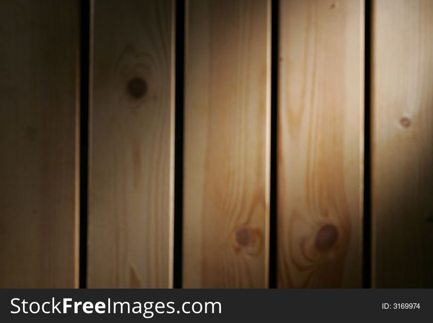 Wooden Wall with cross lighting and blur background. Wooden Wall with cross lighting and blur background