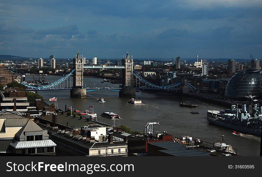 A picture of the London Bridge with other elements of the city