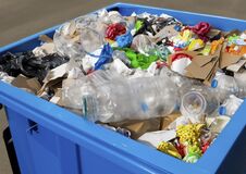 Blue Tank Full Of Garbage, Generated By AI Stock Image
