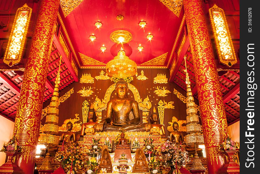 Golden buddha sculptur in church