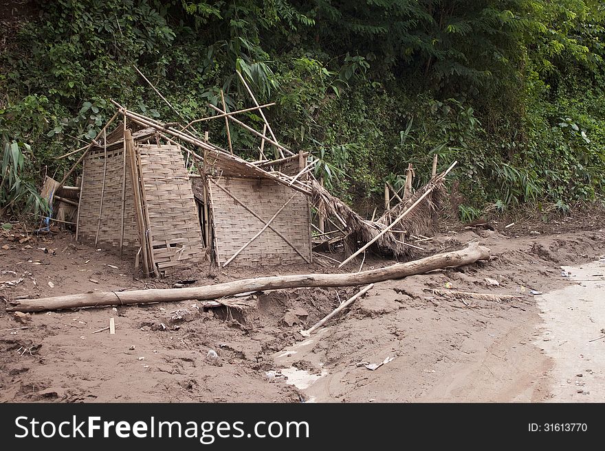 Old wooden broken hut in Laos