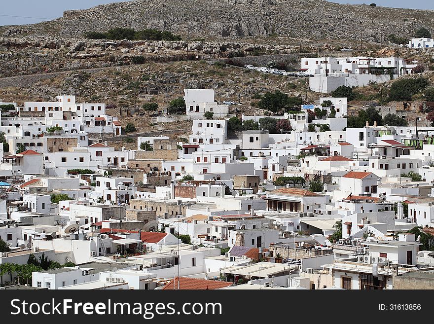 View down on to the pretty white buildings of Lindos on the Island Of Rhodes Greece