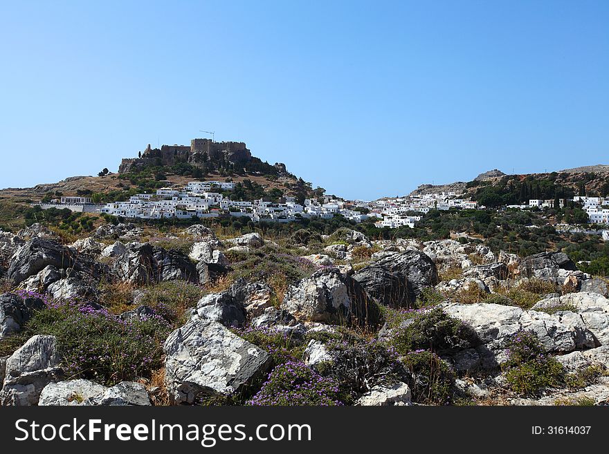 Landscape of the island of Rhodes with a view of the castle and the town of Lindos. Landscape of the island of Rhodes with a view of the castle and the town of Lindos