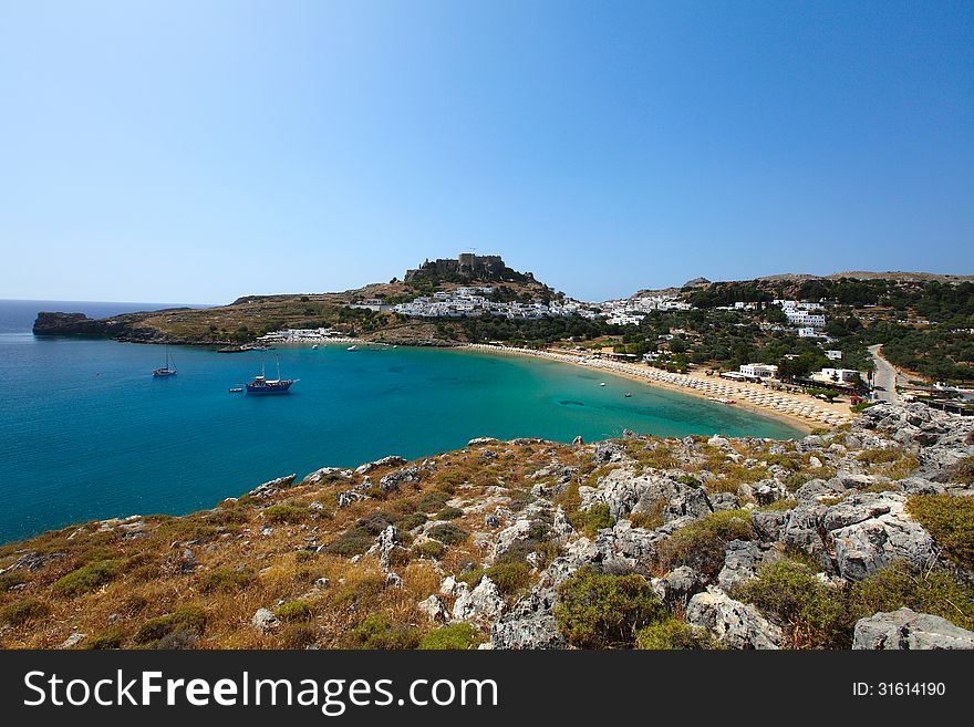 Landscape of the island of Rhodes with a view of the castle and the town of Lindos. Landscape of the island of Rhodes with a view of the castle and the town of Lindos