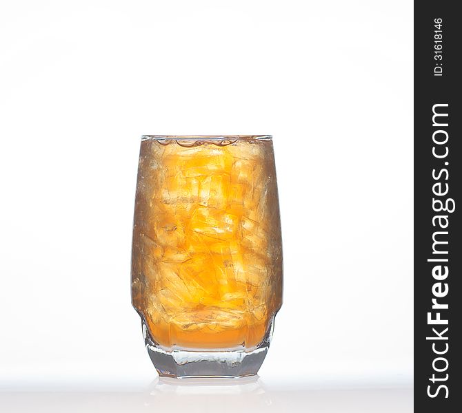 Lemon tea Thai herbal drinks with ice in glass on white background