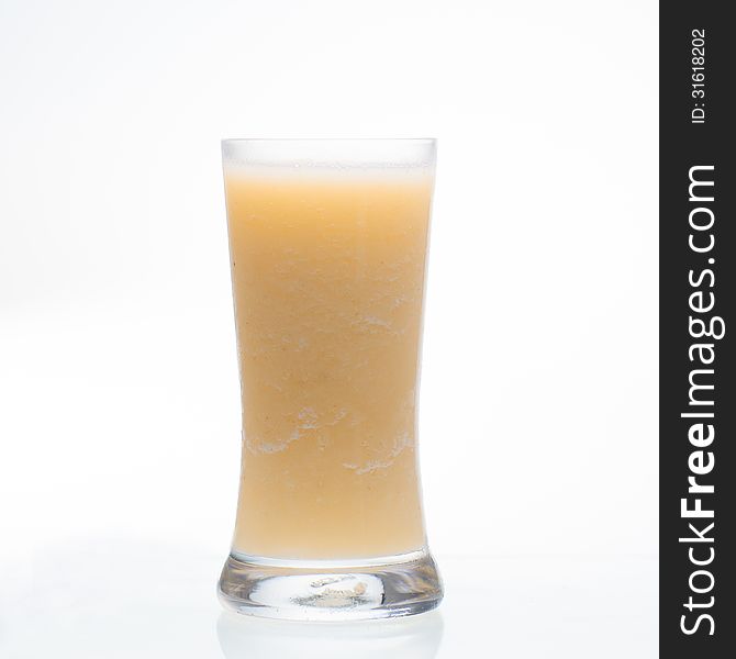 Pineapple shake drink in glass on white background. Pineapple shake drink in glass on white background