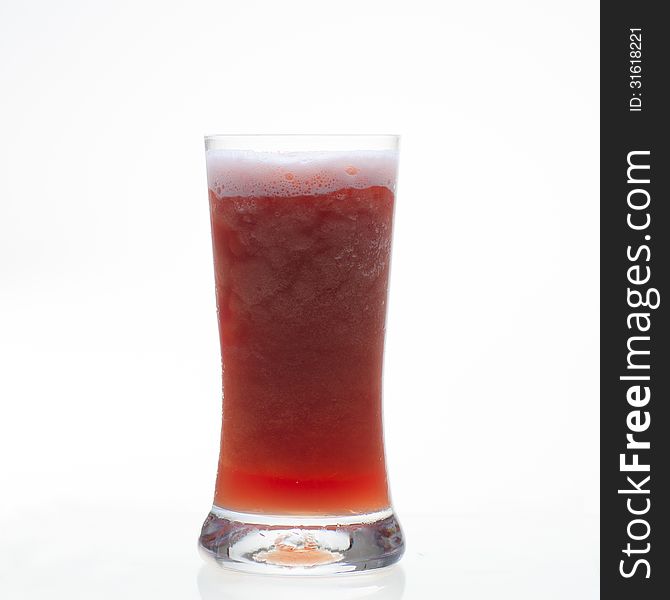 Prune shake healthy drink in glass on white background