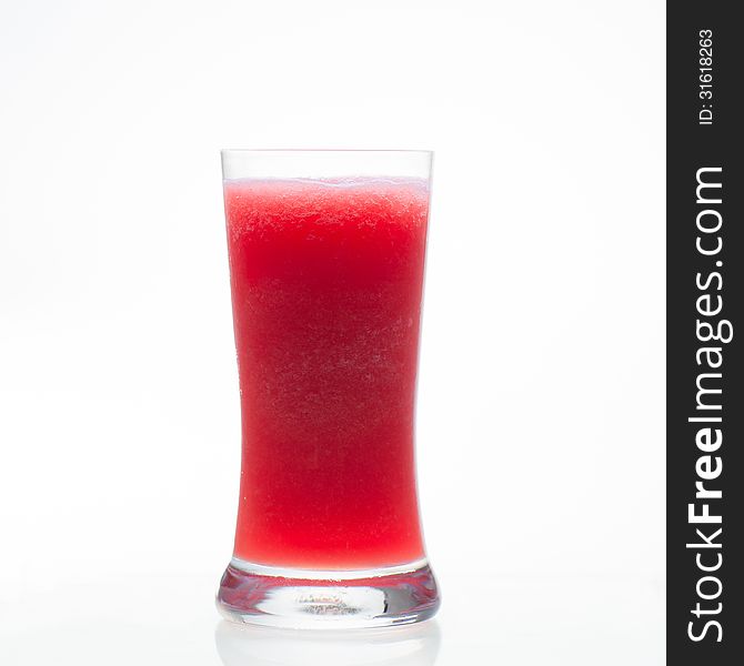 Watermelon shake in glass on white background. Watermelon shake in glass on white background