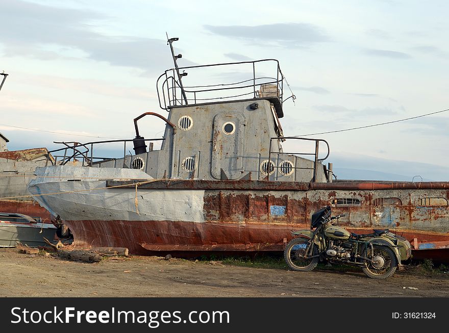 Old rusty ship on the shore of Lake Baikal, Olkhon Island