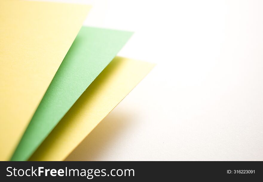 Close up green, yellow and white 3d geometric abstract background with copy empty space