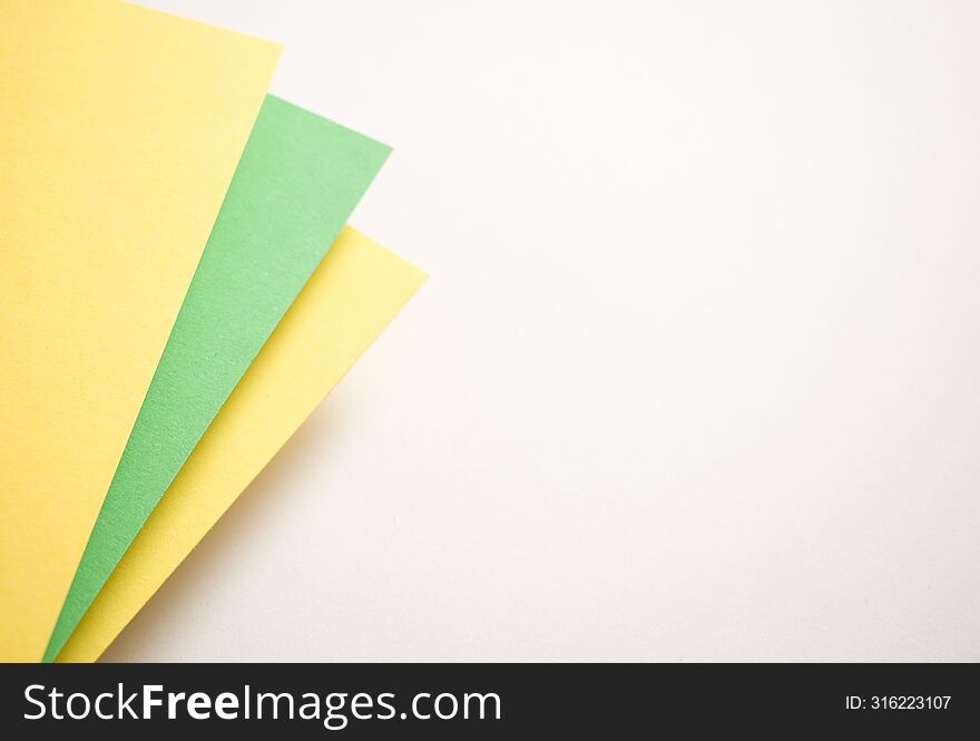 Green, yellow and white 3d geometric abstract background with copy empty space