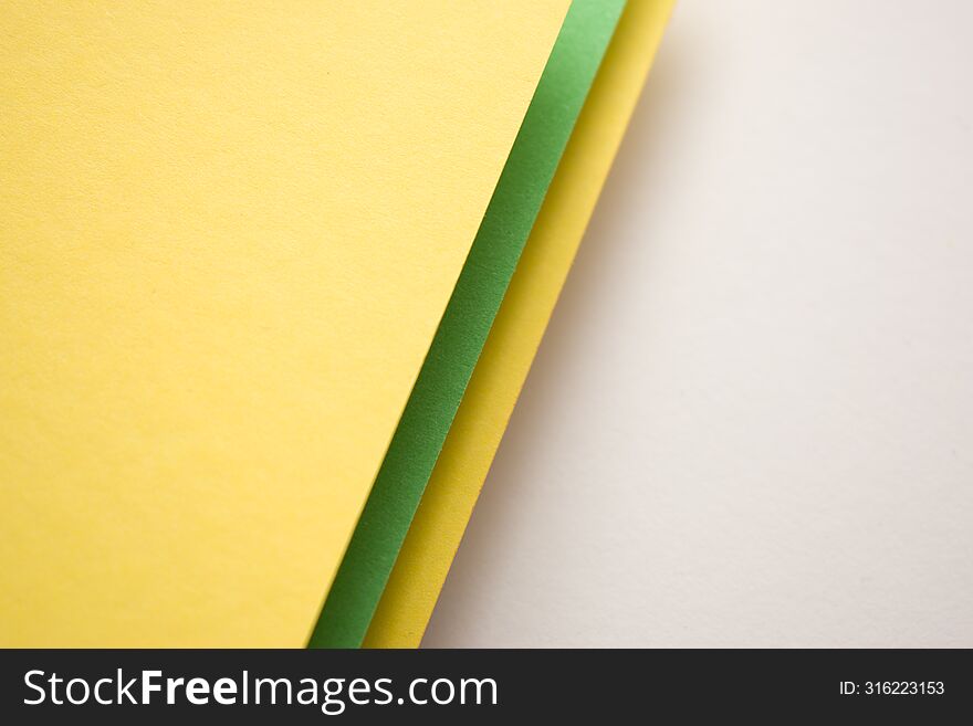 Green, yellow and white diagonally divided 3d geometric background