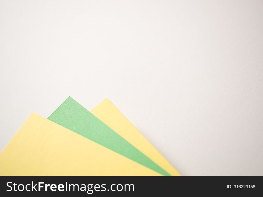 Green, yellow and white geometric abstract background with copy empty space