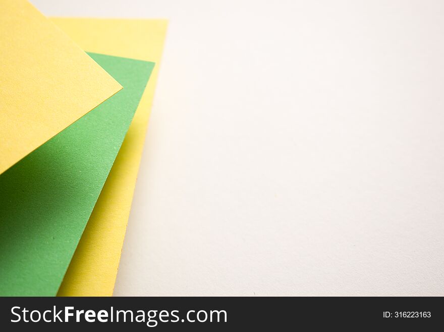 Green, yellow and white geometric background, copy space