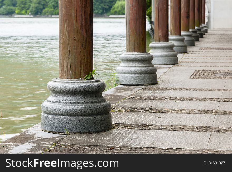 The  photo  is   wooden  Pillars, close up