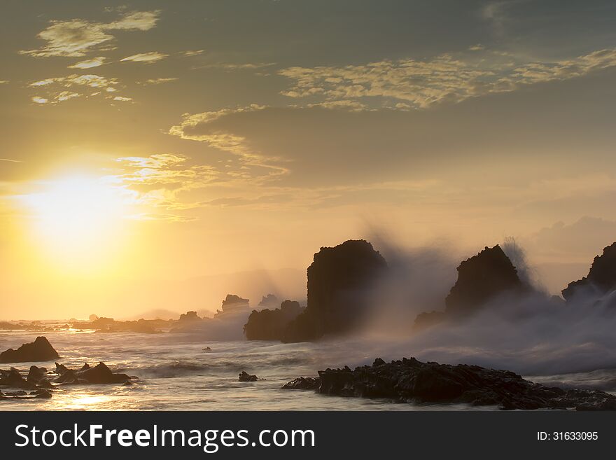 Golden Morning at the beach with waves hit reefs. Golden Morning at the beach with waves hit reefs