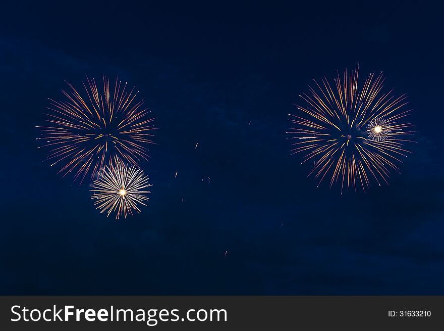 Colorful fireworks of various colors over night sky