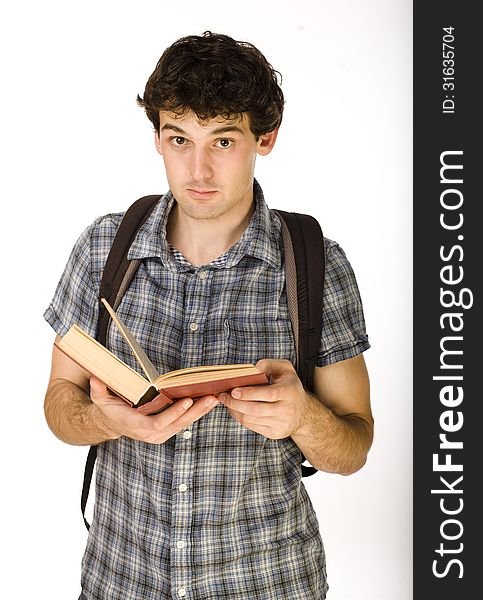 Young Happy Student Carrying Bag And Books