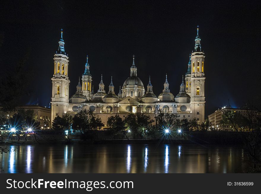 Night view of the baroque Basilica and the river at Saragossa, Spain. Night view of the baroque Basilica and the river at Saragossa, Spain