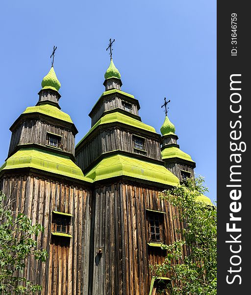 Old wooden church near the village in Folk Arts museum Pirogovo, Kiev, Ukraine. Old wooden church near the village in Folk Arts museum Pirogovo, Kiev, Ukraine