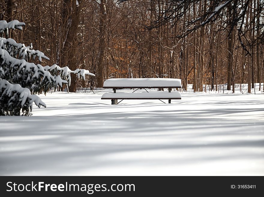 The Picnictable Under Deep Layer Of Snow In The Park