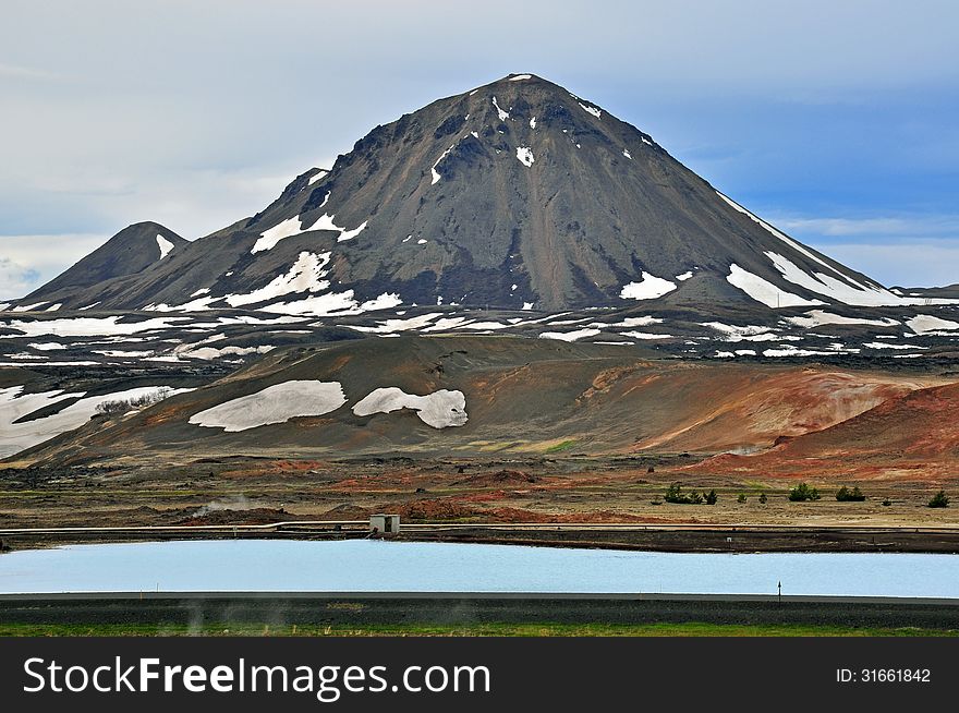 Volcano peak at Myvatn lake in Iceland