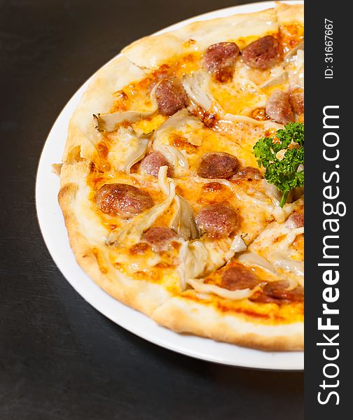 Italian pork sausage pizza with Moss Beach Marella cheese and mushrooms