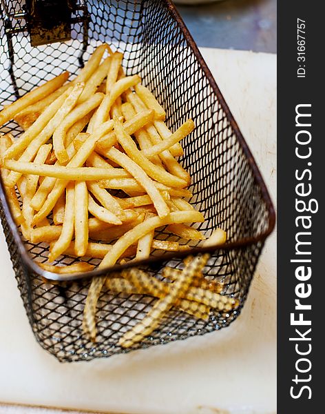 French fries in a pan basket