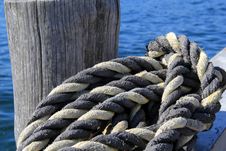 Thick Knotted Rope At The Boat Dock Royalty Free Stock Photos Thick Knotted Rope At The Boat Dock Royalty Free Stock Photos