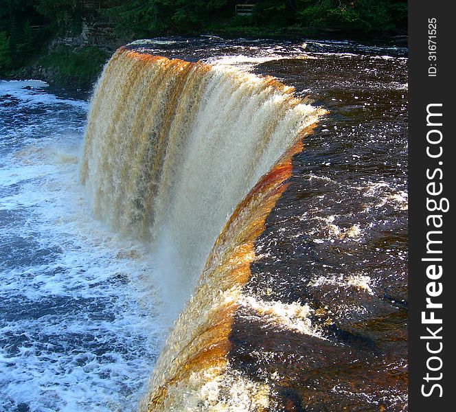 Tahquamenon Falls and Rapids on river in Upper Peninsula, Michigan. Tahquamenon Falls and Rapids on river in Upper Peninsula, Michigan