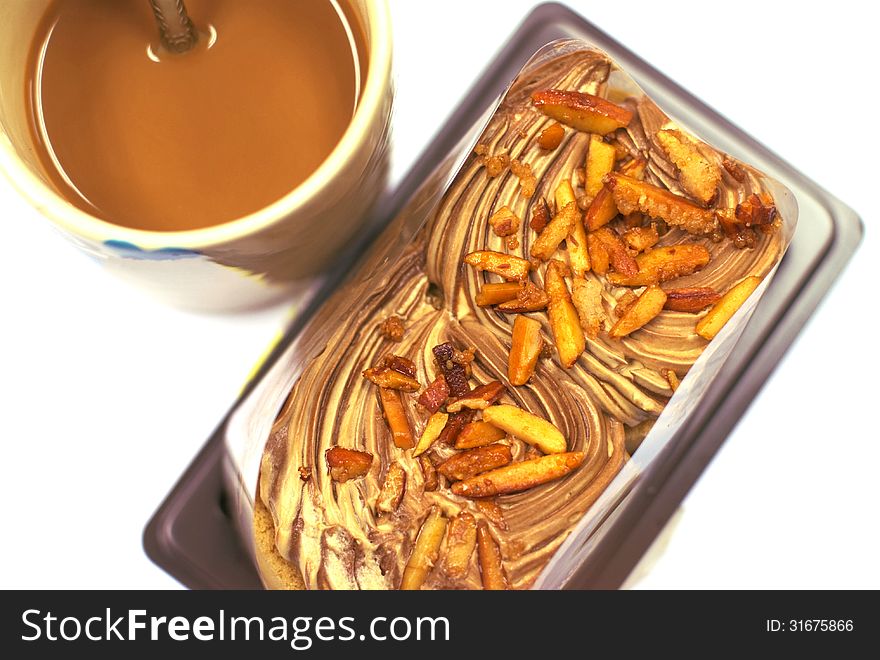 Almond cake and coffee on white background