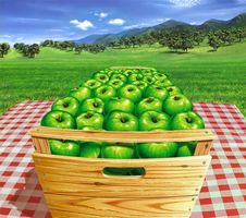 Green Apples In A Wooden Box On A Table, With Landscape And Apple-trees At The Background. Stock Photo Green Apples In A Wooden Box On A Table, With Landscape And Apple-trees At The Background. Stock Photo