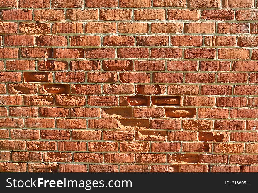 Old Weathered Clay Brick Wall Still Standing After  Almost A Century.