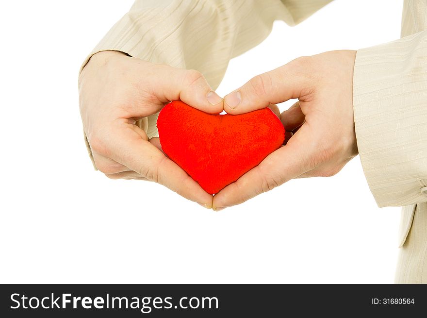 The guy in a suit keeps the heart isolated on white background