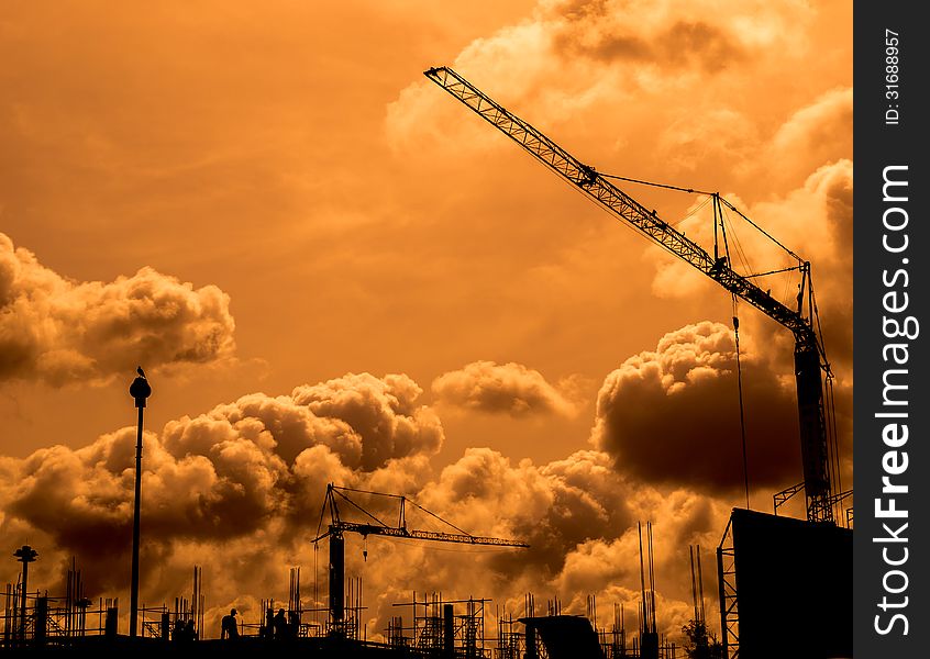 Construction site with cloudy sky in the evening