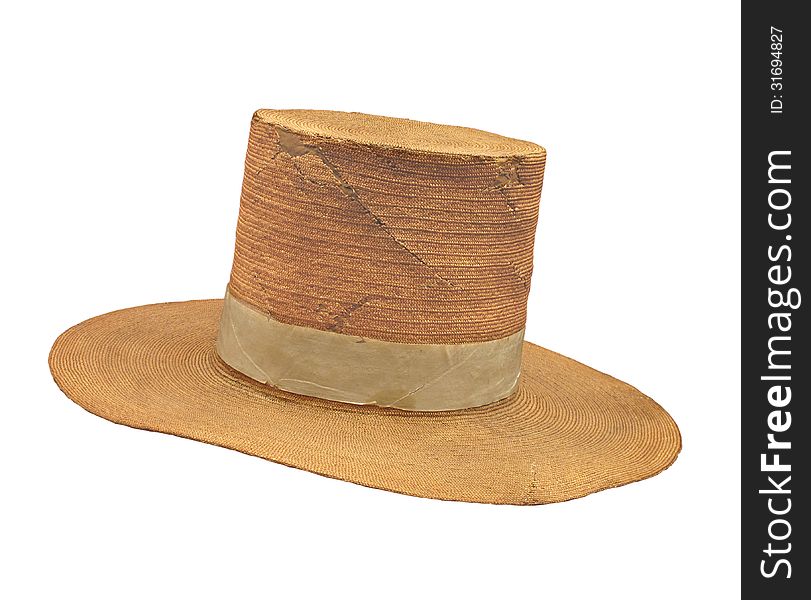 Old high-top straw hat isolated.