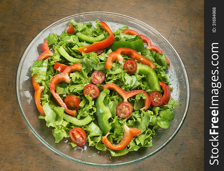 Green salad on glass plate. Green salad on glass plate