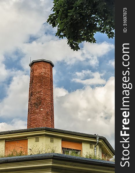 An old red circular chimney. An old red circular chimney.