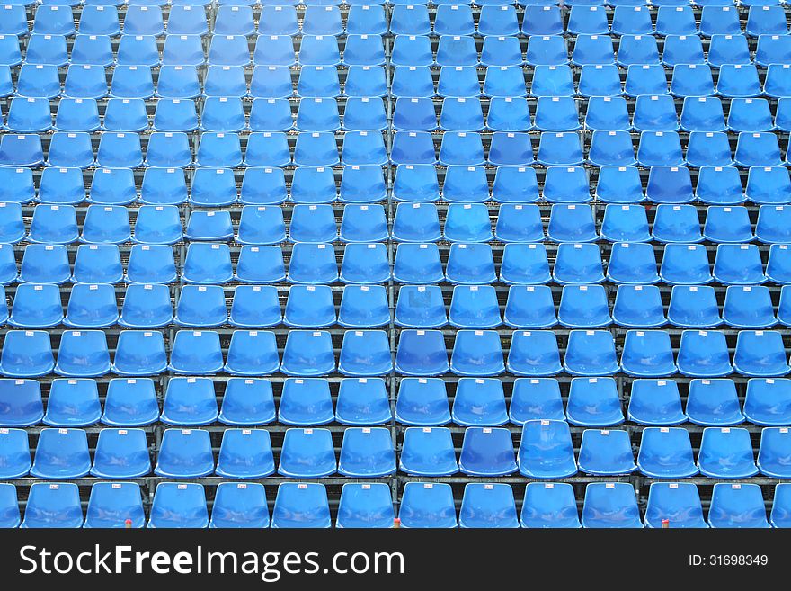 Blue chairs in the ground