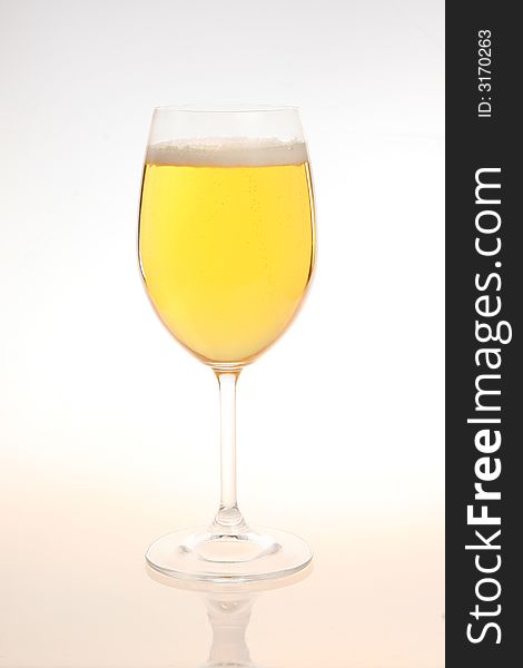 Glass of light  beer  on white background. Glass of light  beer  on white background